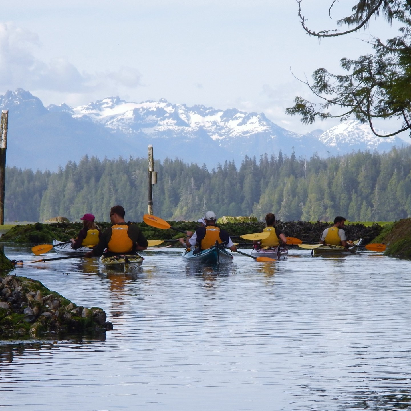 a group of people on a boat in the water