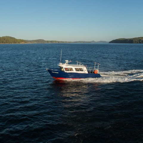 a small boat in a large body of water
