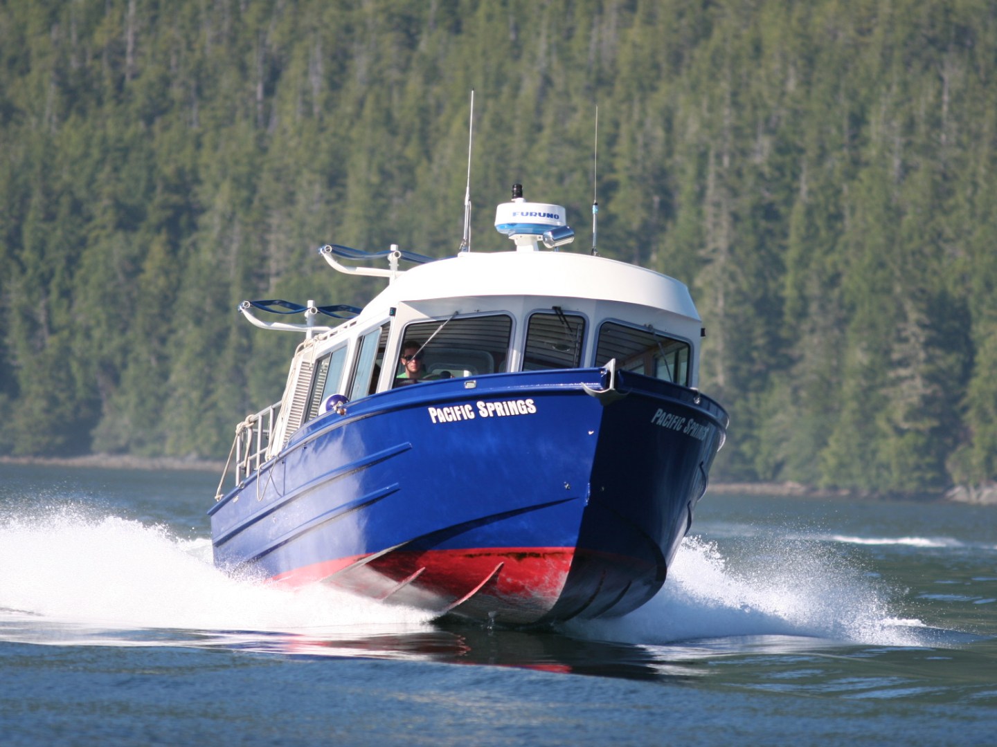 boat driving on the ocean