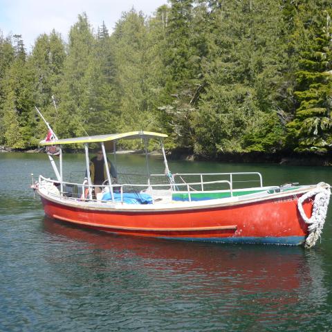 a small boat in a body of water